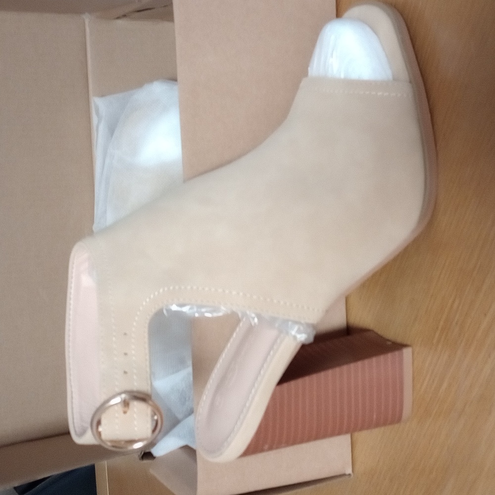 Peep toe sandal with strap buckle booties